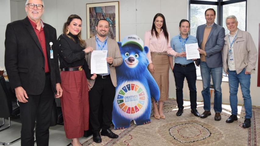 A parceria, firmada entre a Superintendência Geral de Desenvolvimento Econômico e Social e a Caixa